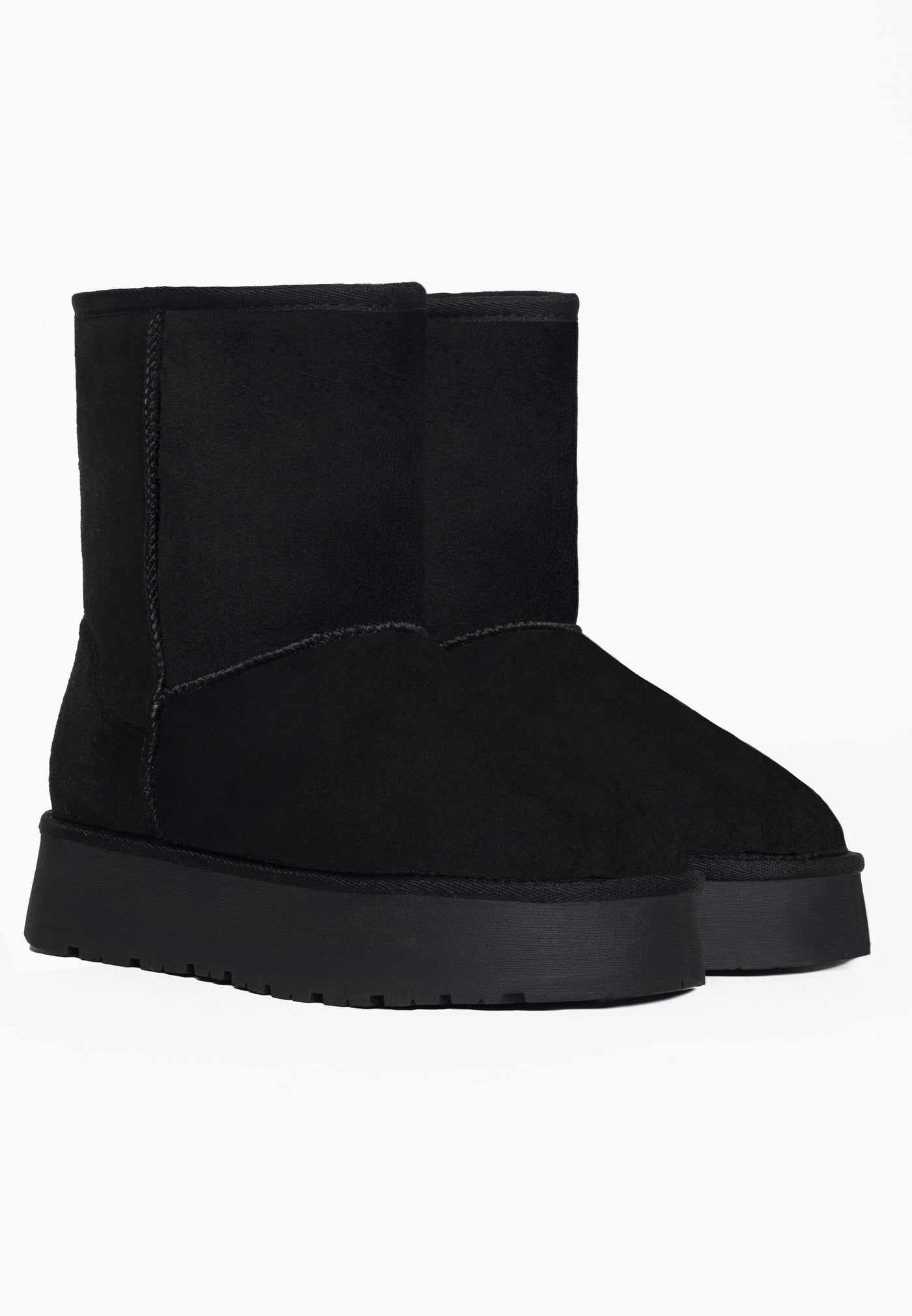 Bottines fourrées Joy noires vues de trois-quarts, tige haute et parfaitement unie