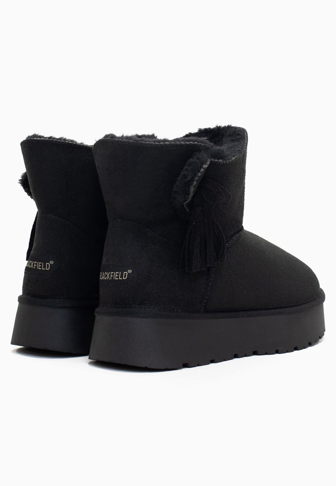 Paire de bottines fourrées Curry noires de dos, deux glands et deux étiquettes