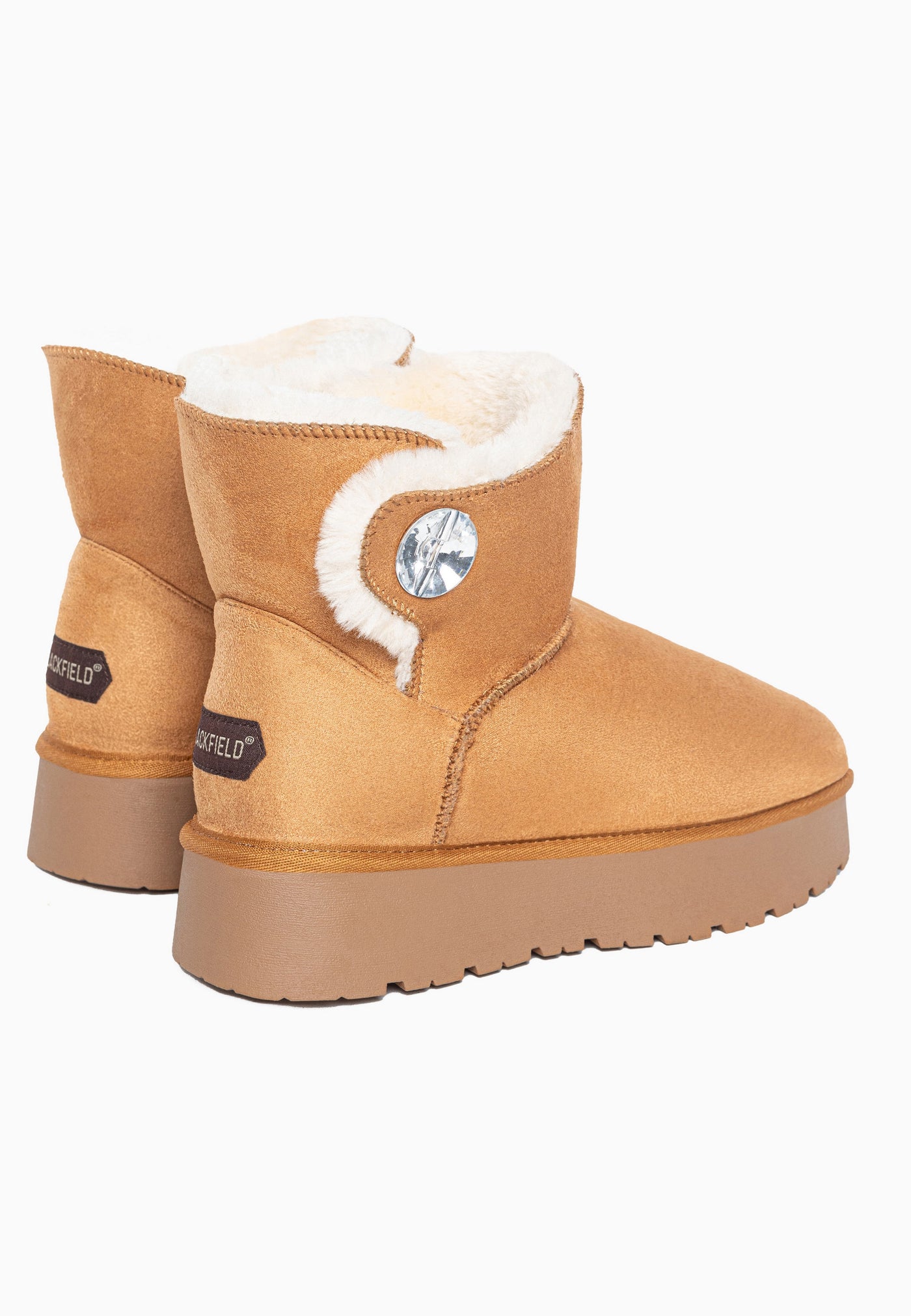 Deux bottines fourrées Jana camel vues de dos, doublure crème et boutons brillants