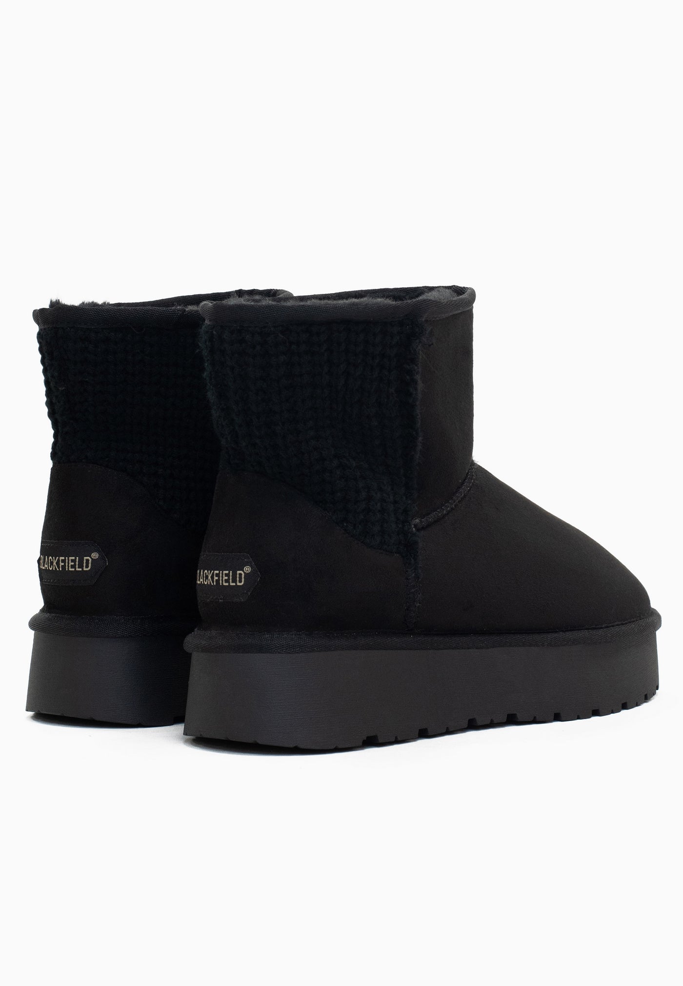 Paire de bottines fourrées Davia noires de dos, deux étiquettes claires aux talons