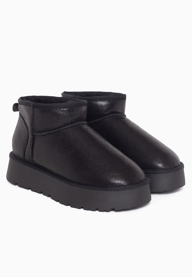 Bottines fourrées Milli noir métallisé vues de trois-quarts, plateforme mate crantée