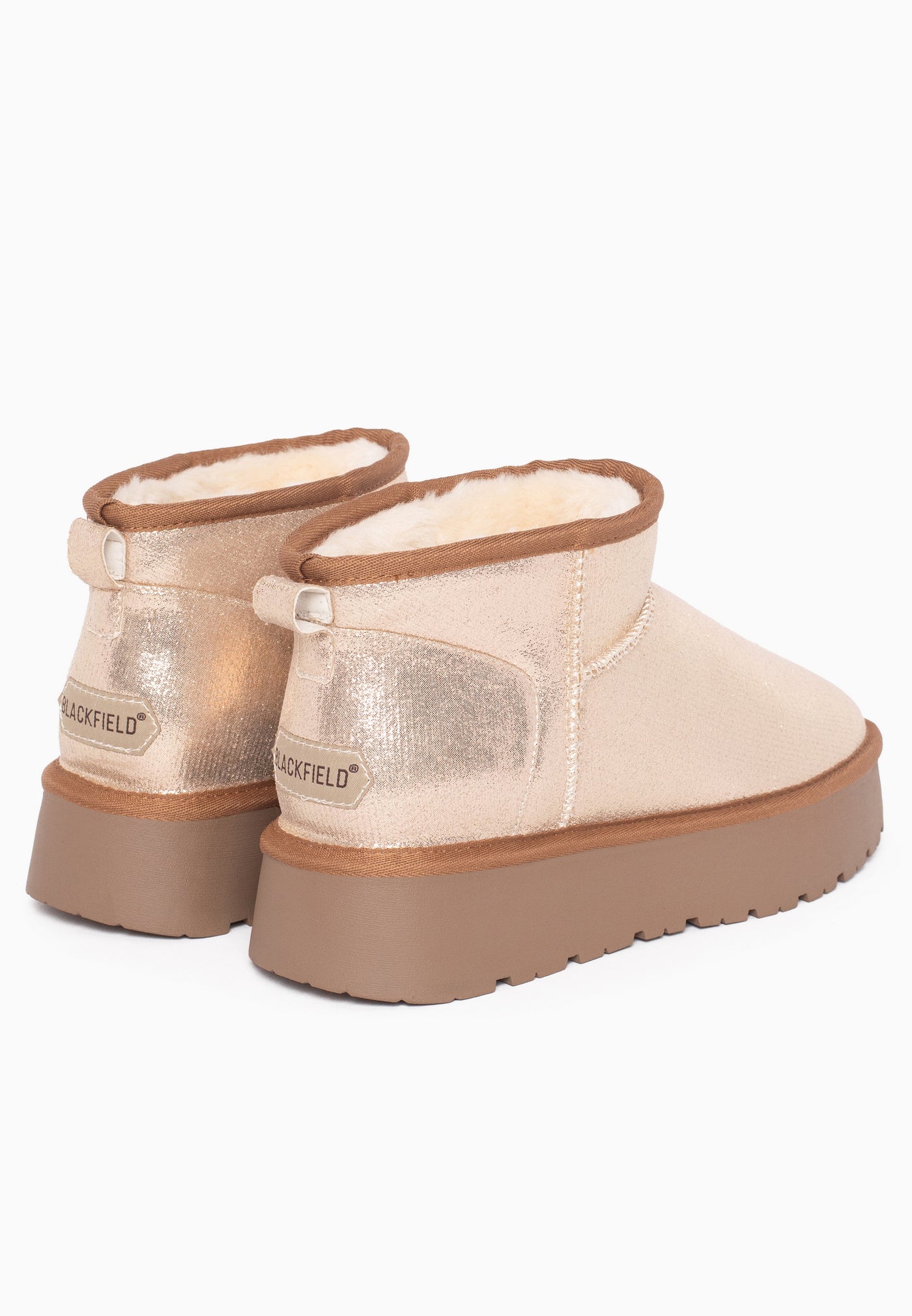 Paire de bottines fourrées Milli camel doré de dos, étiquettes cousues aux talons