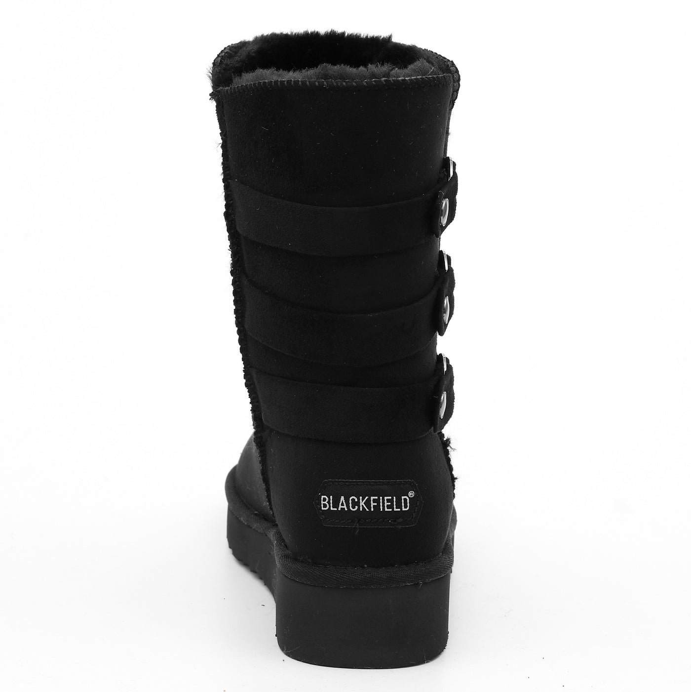 Talon de la botte fourrée Gena noire de dos, étiquette Blackfield blanche cousue