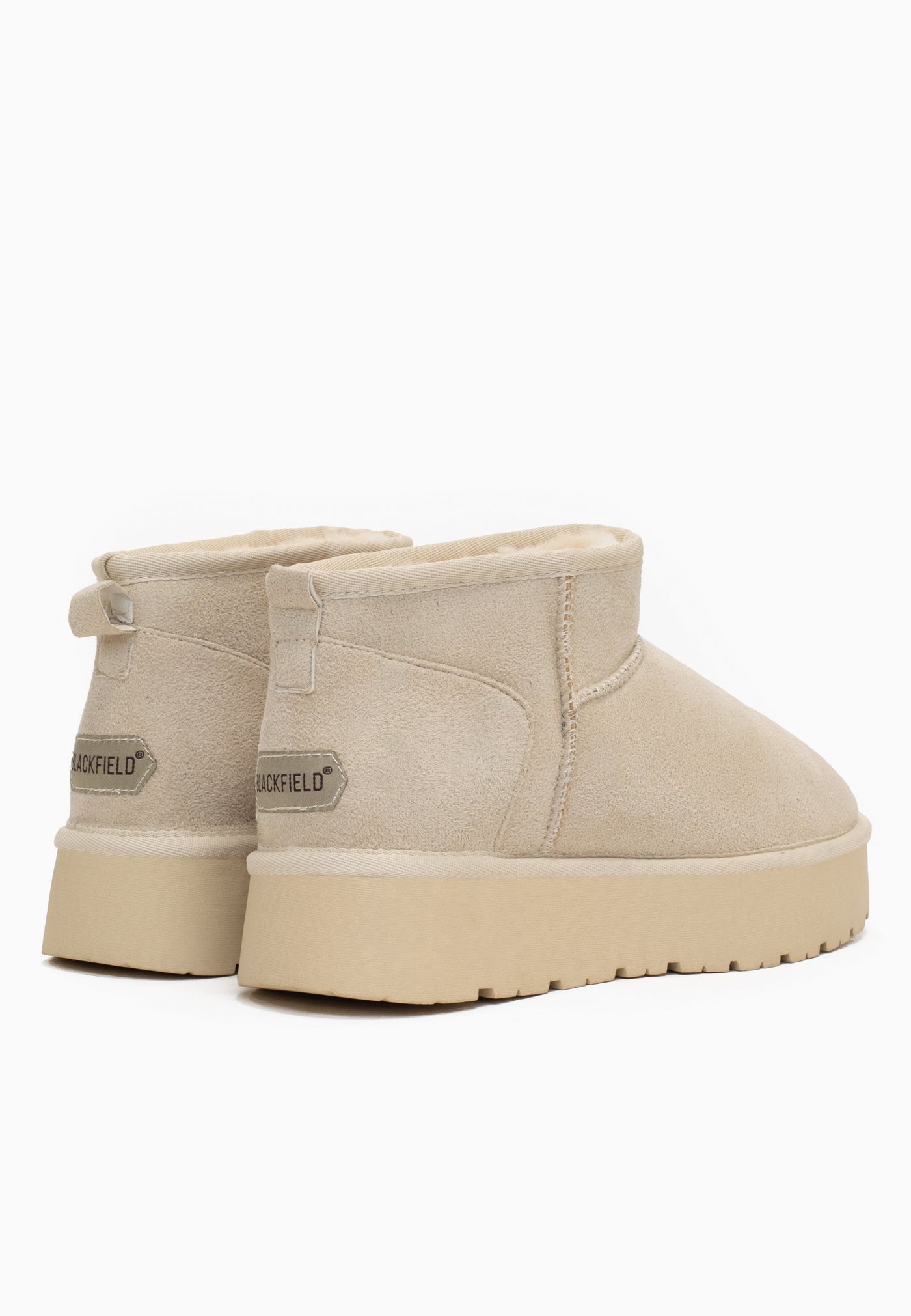 Paire de bottines fourrées Milli blanc cassé de dos, étiquettes écrues aux talons