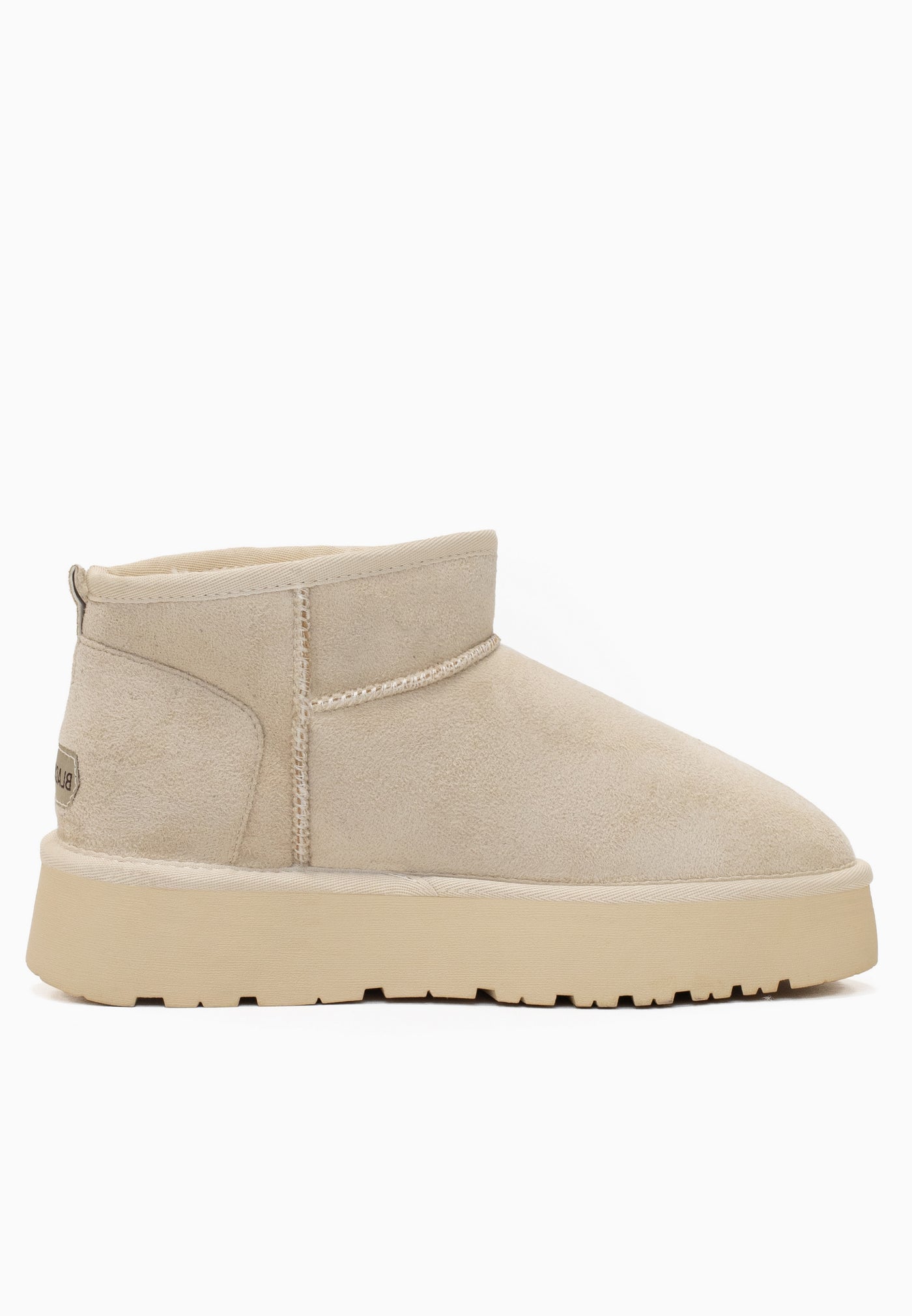 Bottine fourrée Milli blanc cassé vue de l'autre côté, couture du coup de pied