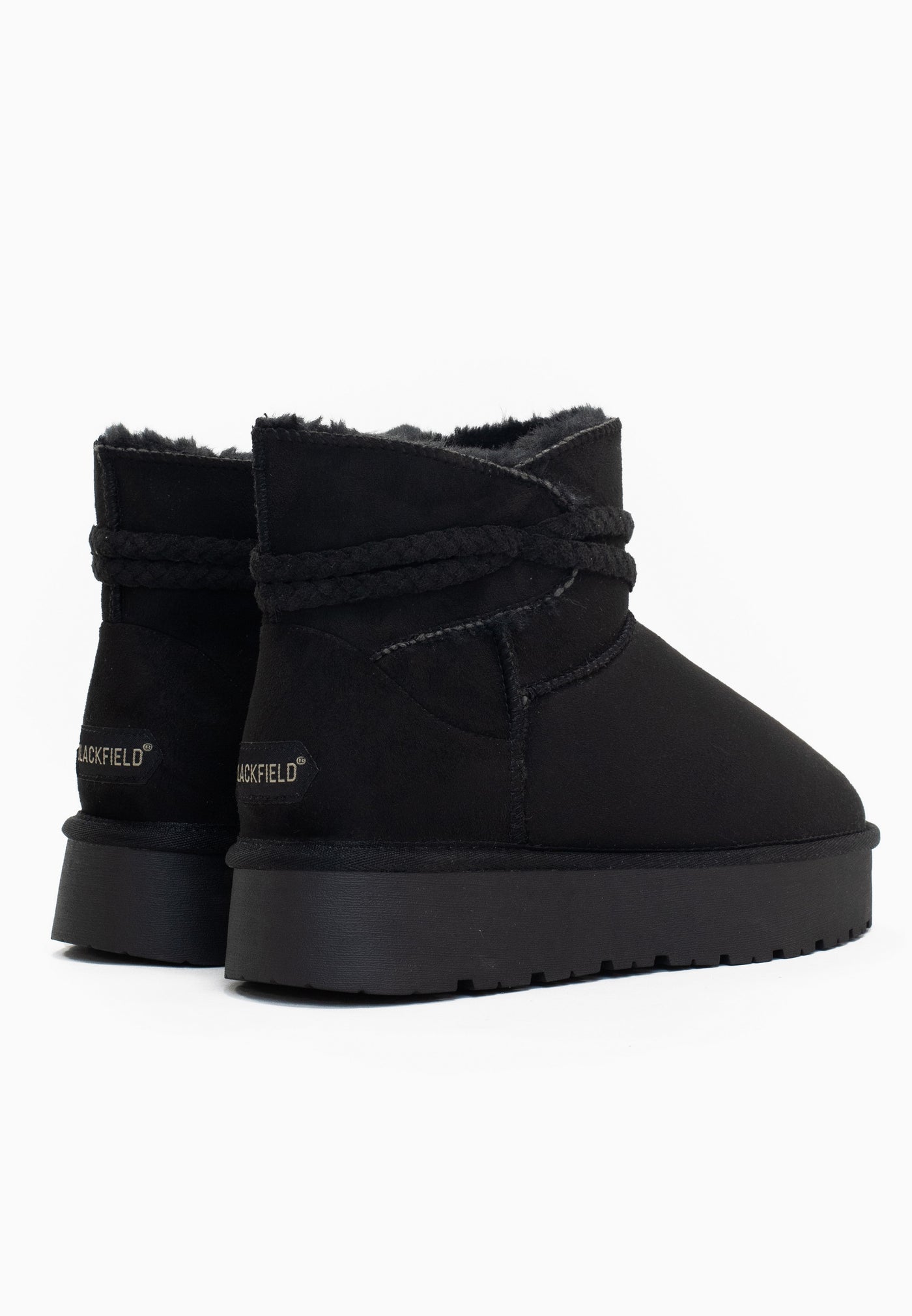 Paire de bottines fourrées Mergie noires vues de dos, nom Blackfield clair au talon