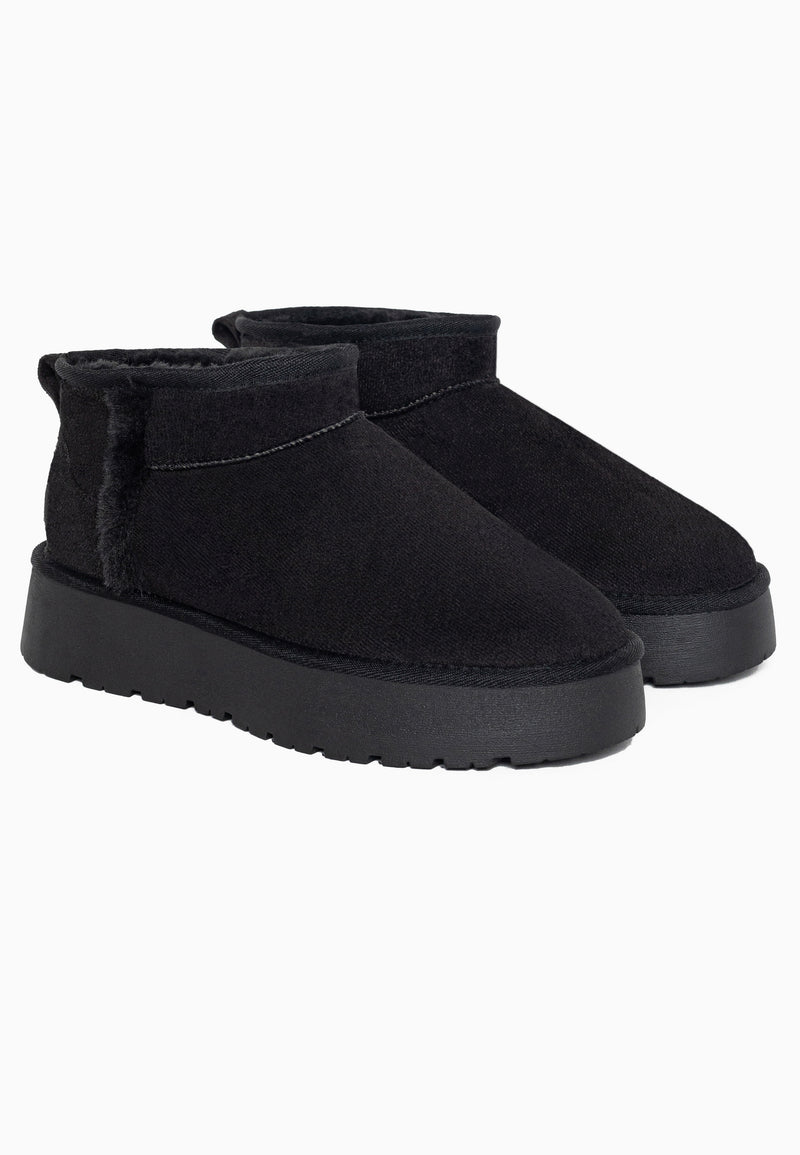 Bottines fourrées Brizz noires en paire, liseré de fausse fourrure noire au quartier