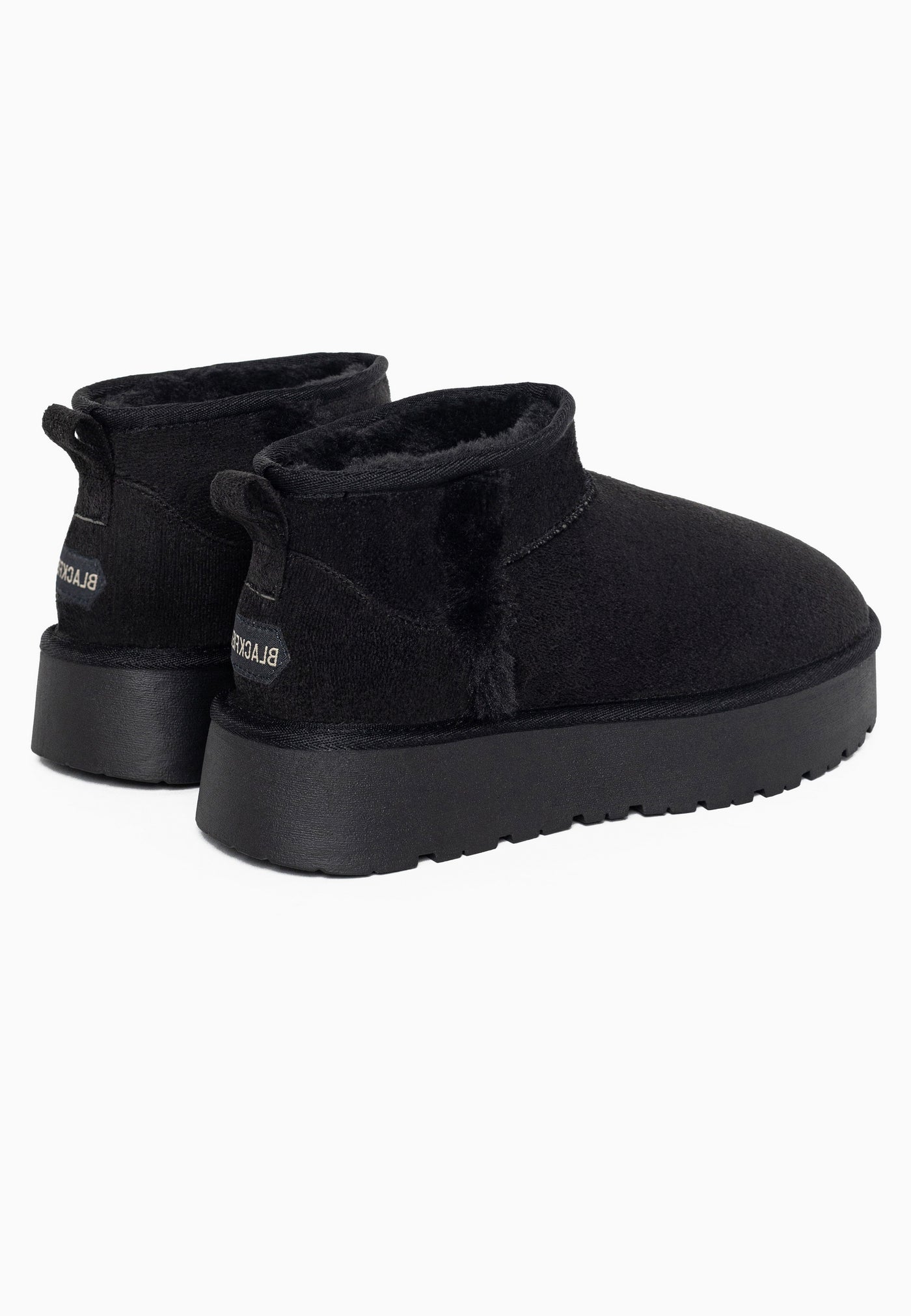 Bottines fourrées Brizz noires de dos, boucles de tirage cousues en haut des talons
