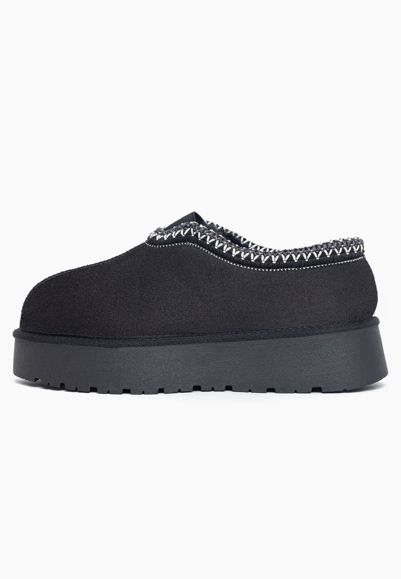 Bottine fourrée Ben noire vue de profil, broderie blanche qui souligne l’ouverture