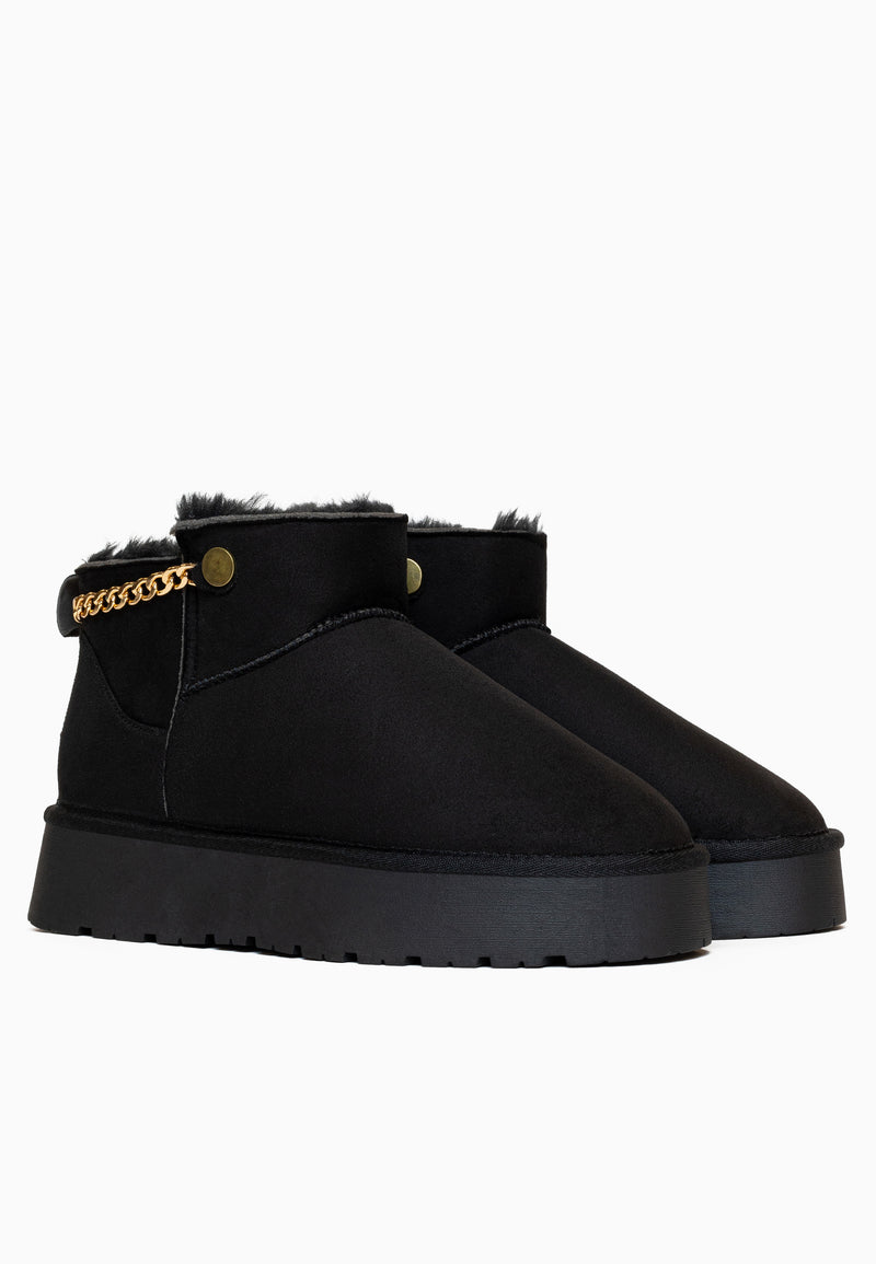 Deux bottines fourrées Ekhlas noires de trois-quarts arrière, chaîne dorée sur le col