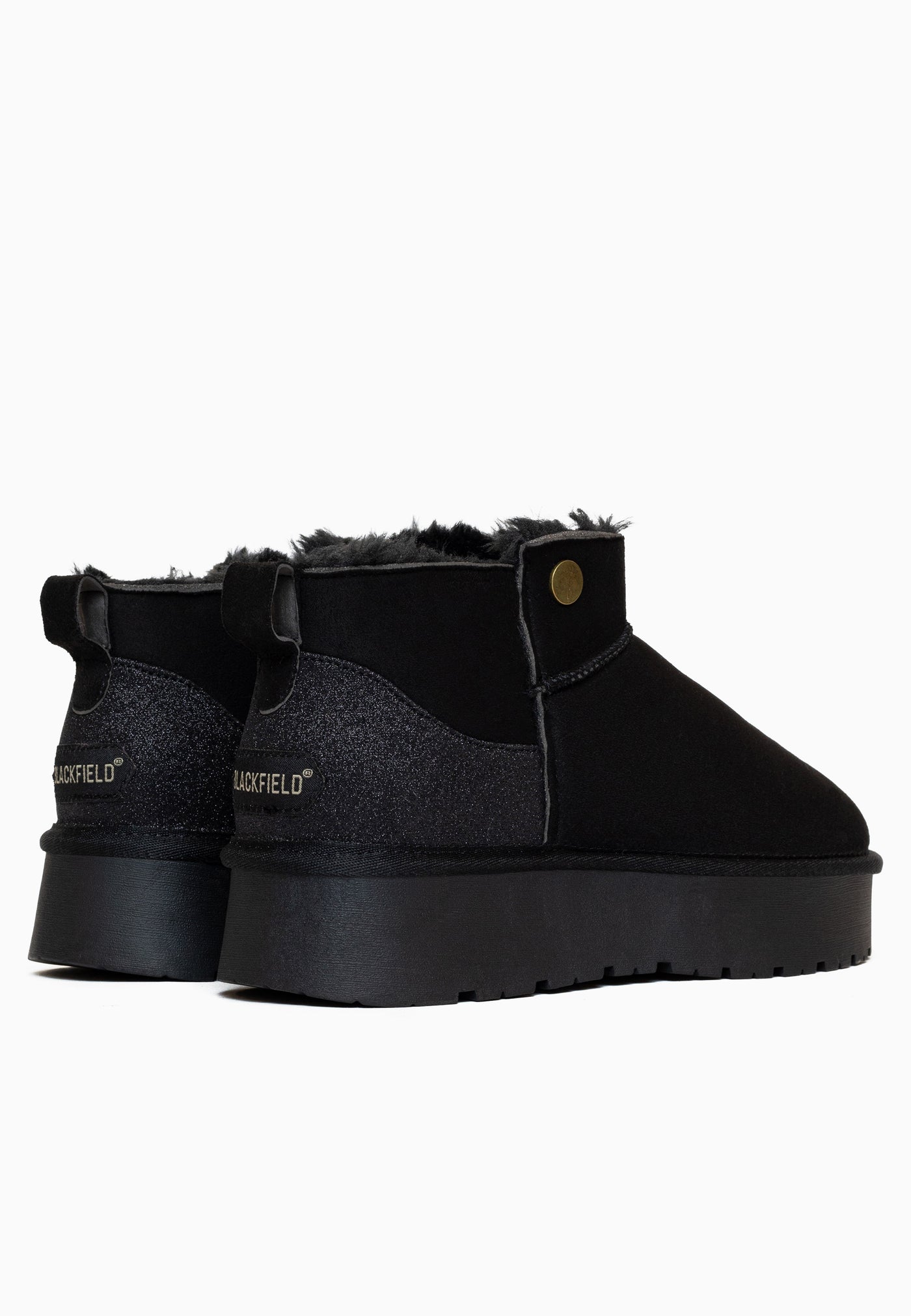 Paire de bottines fourrées Edeh noires de dos, étiquettes dorées sur les talons