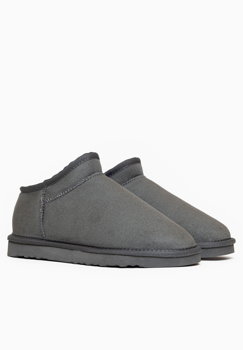 Deux bottines fourrées Fiaza anthracite posées de trois-quarts, tiges basses et bords échancrés