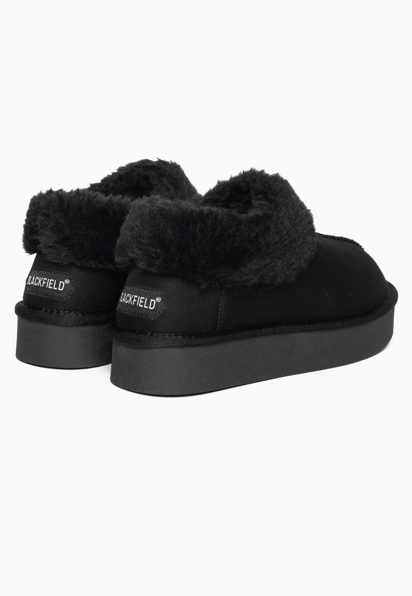 Bottines fourrées Bloom noires de dos, étiquettes blanches cousues aux deux talons
