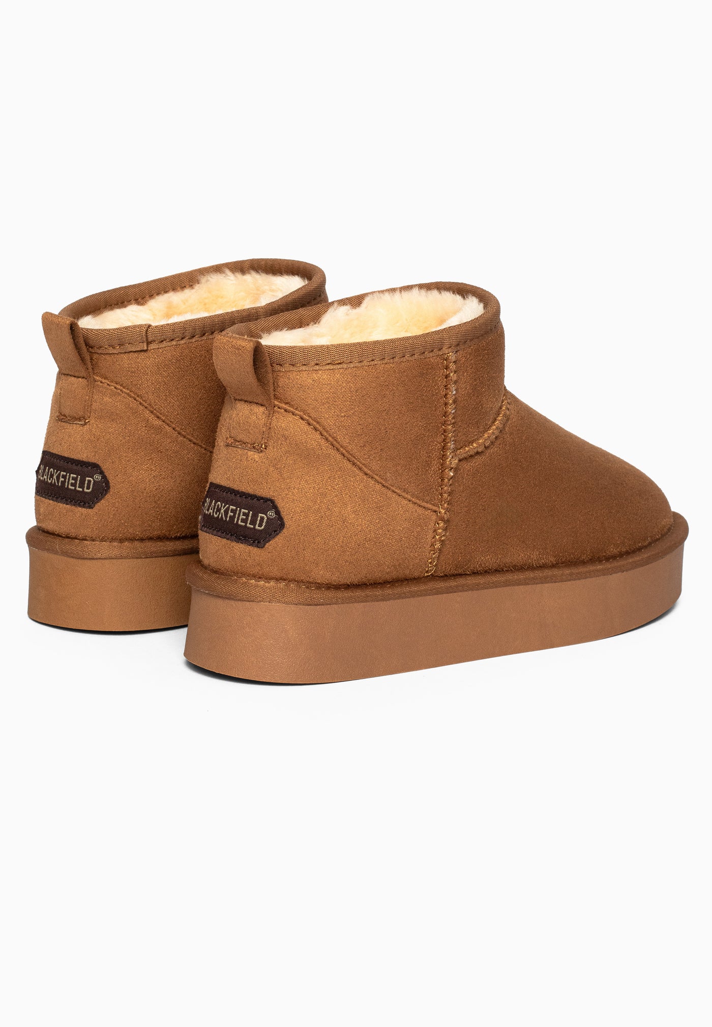 Paire de bottines fourrées Beryl camel de dos, bord garni de fausse fourrure crème