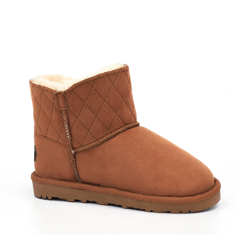 Botte fourrée enfant Tinke camel de trois-quarts, empiècement matelassé et doublure crème