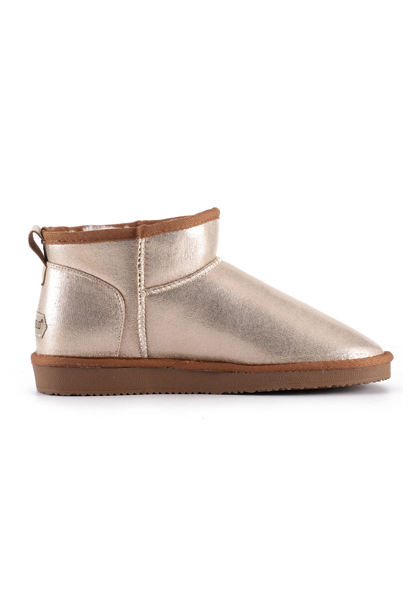 Bottine fourrée Mikela beige de profil, reflet doré et bord caramel au col