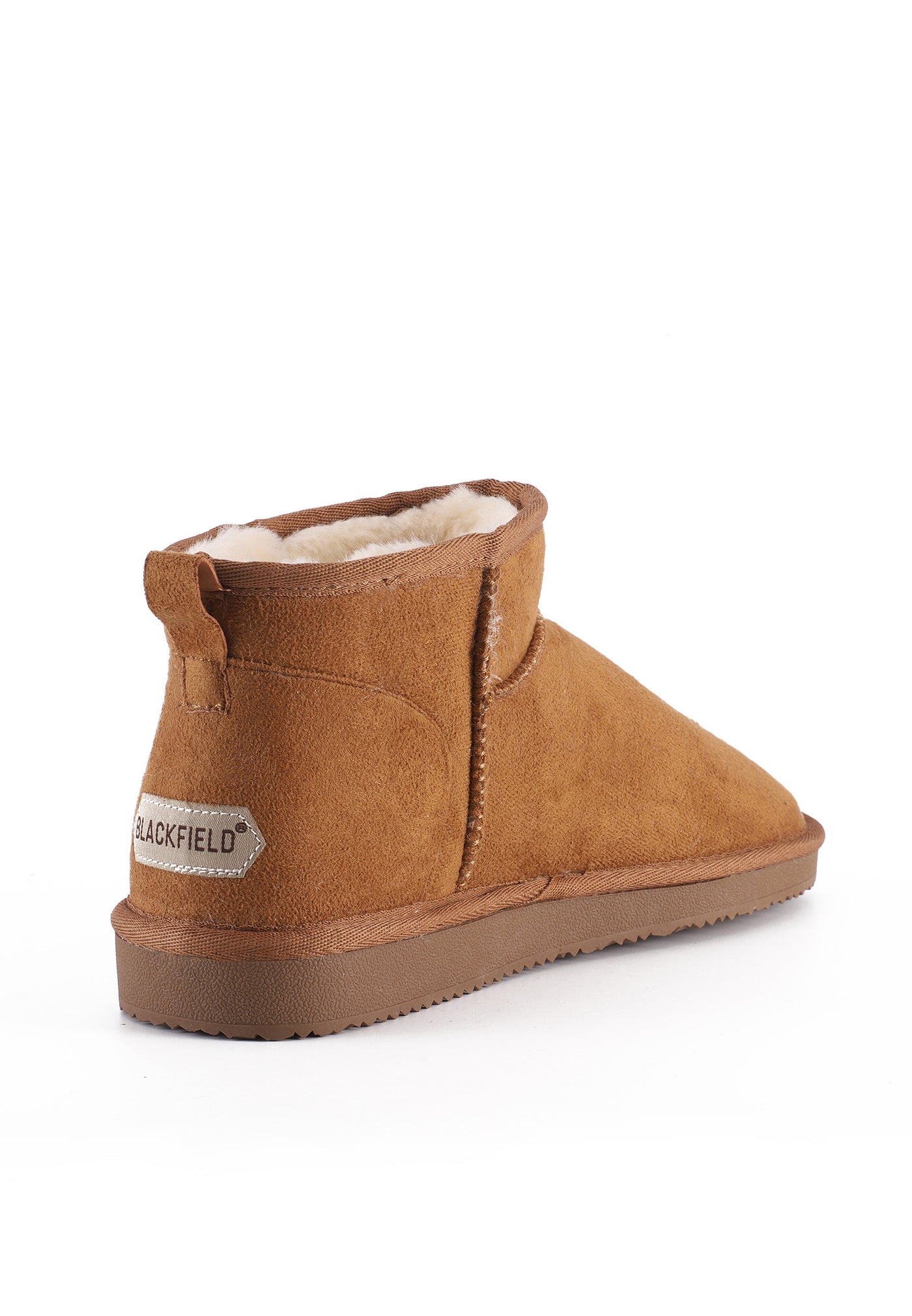 Bottine fourrée Mini Milli camel de trois-quarts arrière, étiquette Blackfield au talon
