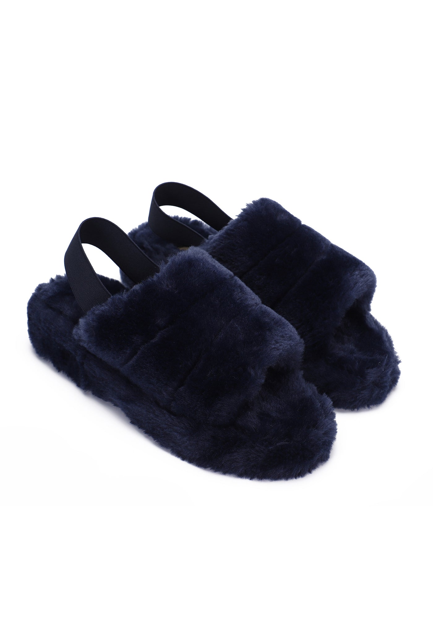 Paire de chaussons fourrés Polly marine de trois-quarts, brides élastiques bleu nuit