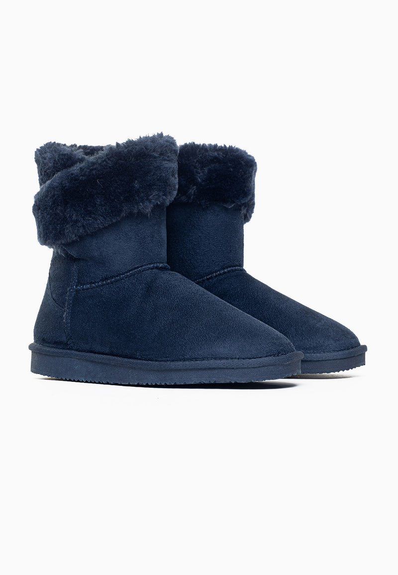 Paire de bottines fourrées Barbara marine de trois-quarts, revers duveteux rabattus