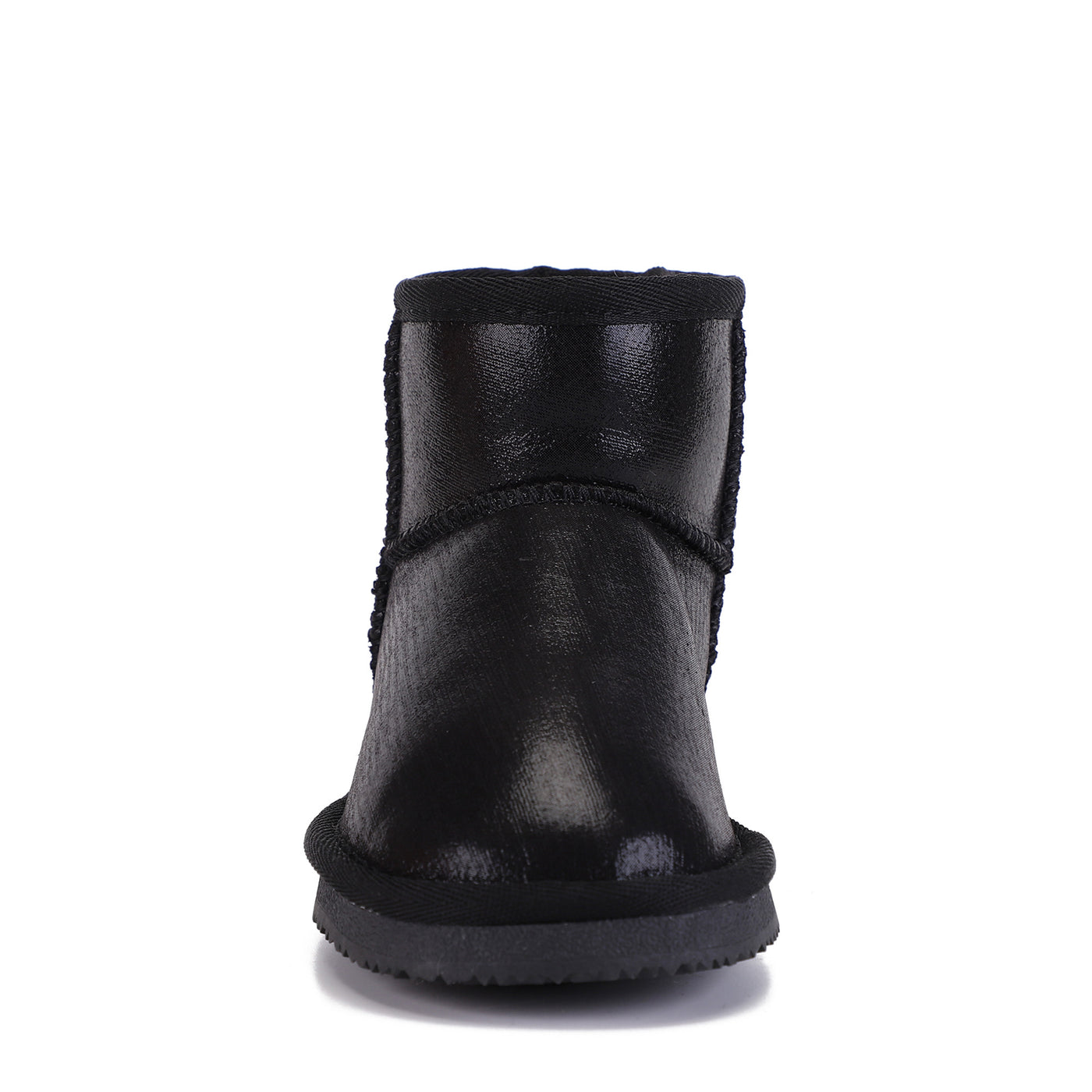 Botte fourrée enfant Agnes noire vue de face, bout rond et semelle souple noire assortie