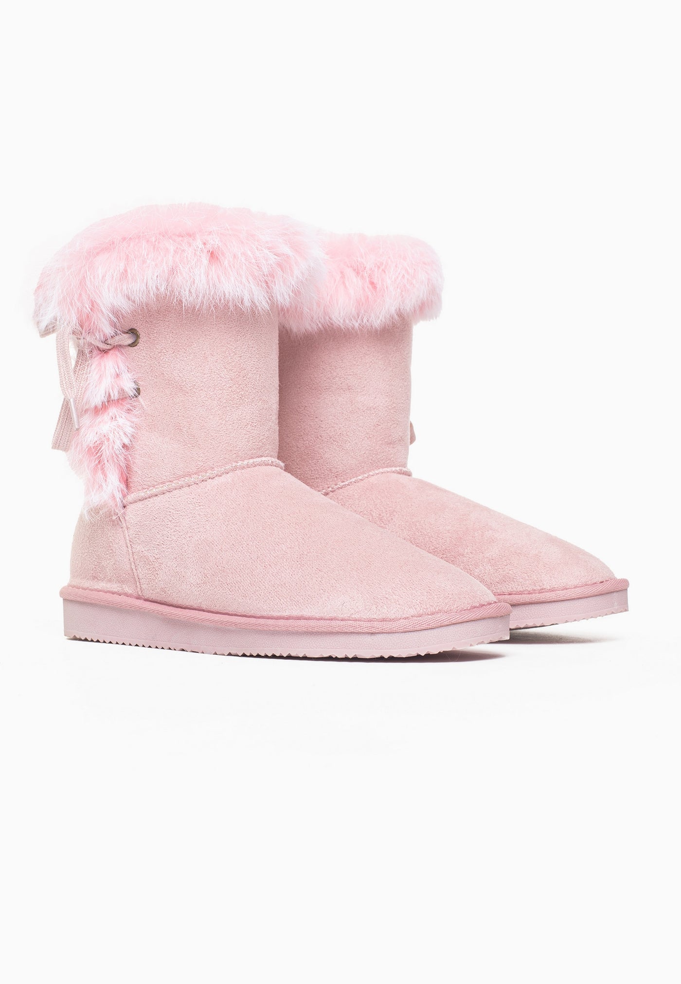 Paire de bottines Mi-mollet Chuckson rose fourrées, lacet noué et pompons roses
