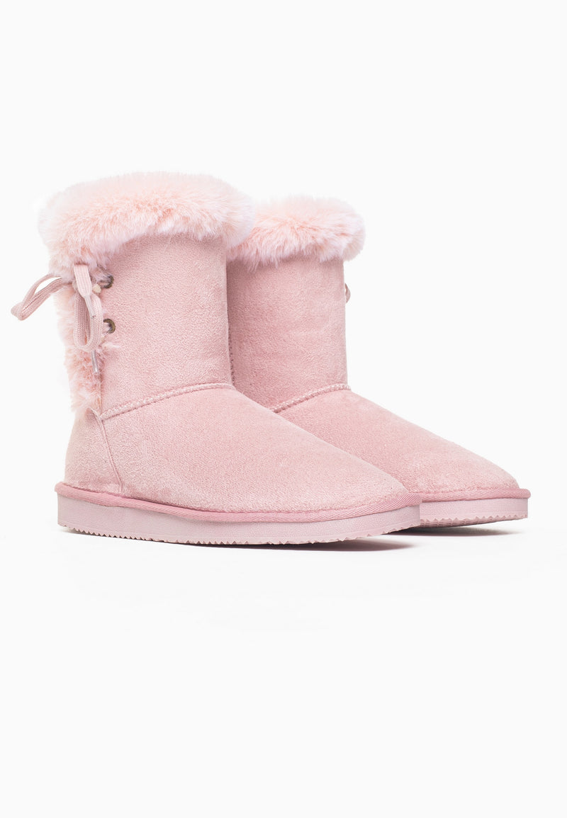 Paire de bottines fourrées Coma rose vue de profil, cols de fausse fourrure repliés vers l'extérieur
