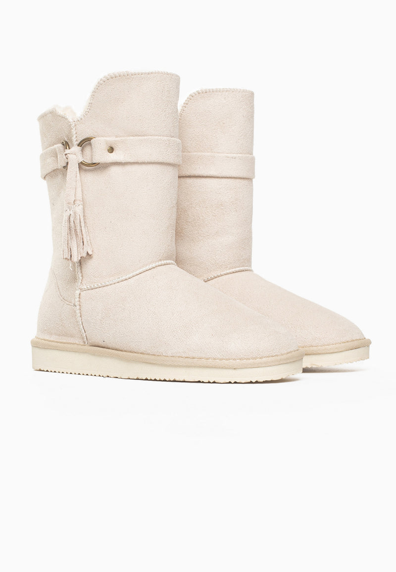 Paire de bottes fourrées Greede naturel de trois-quarts, brides et glands écrus