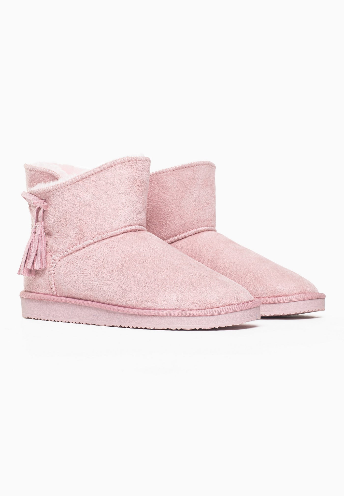 Paire de bottines fourrées Curry rose de trois-quarts, cols rabattus et glands