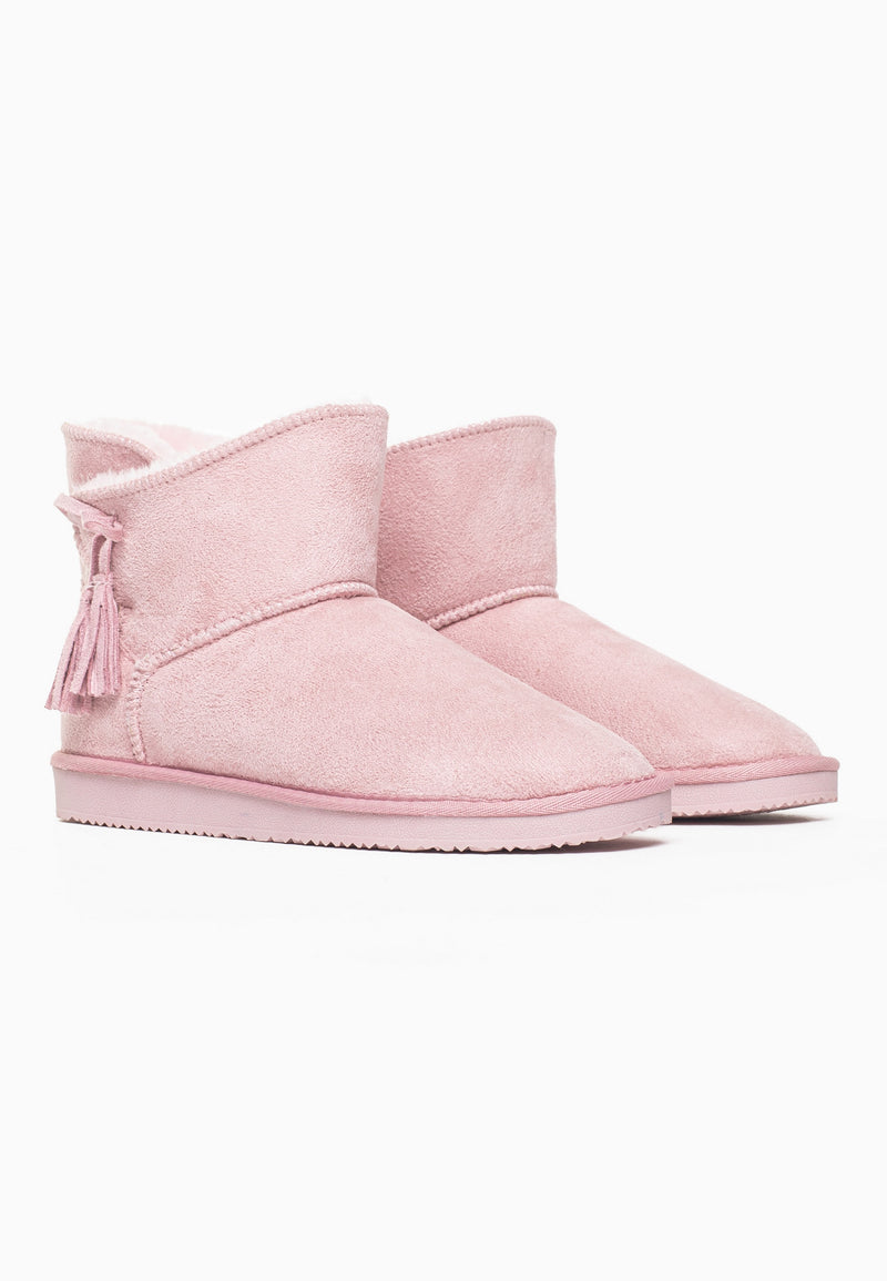 Paire de bottines fourrées Curry rose de trois-quarts, cols rabattus et glands