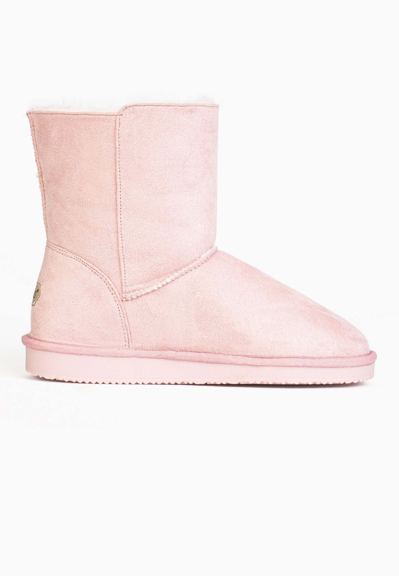 Bottine fourrée Nueltin rose vue de l'autre côté, tige unie et couture en courbe