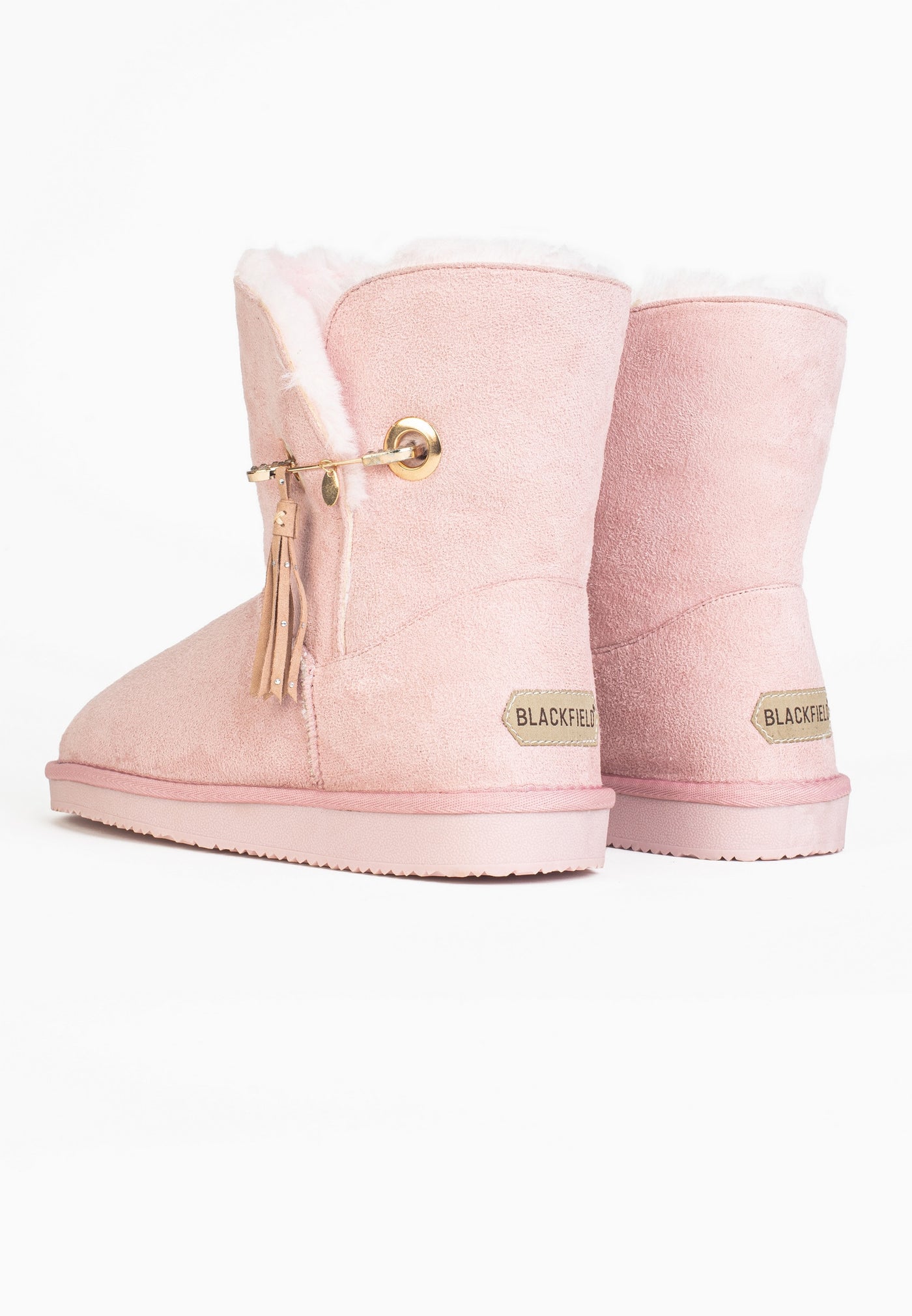 Paire de bottines fourrées Clair roses vue de dos, étiquettes dorées aux talons