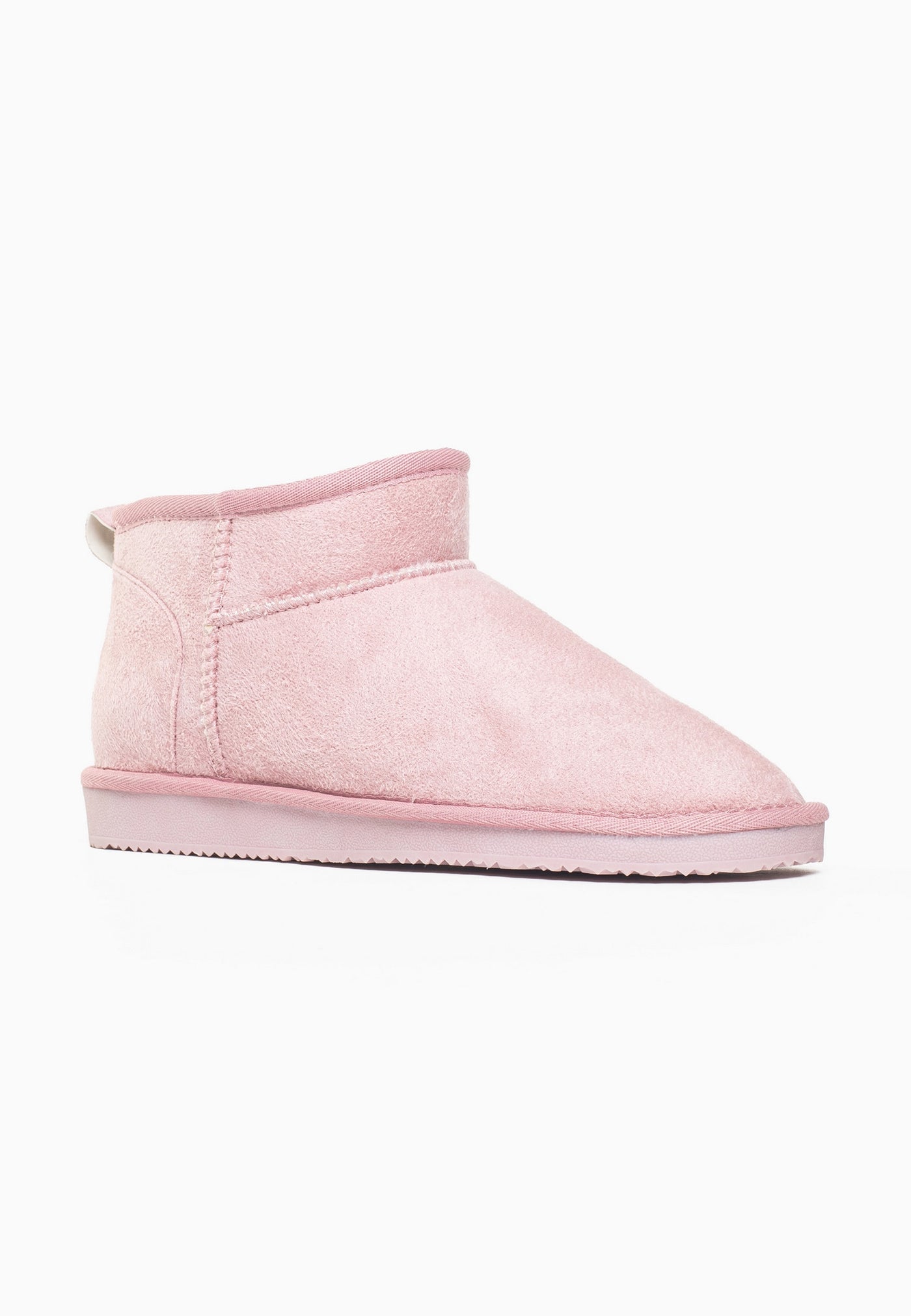 Bottine fourrée Mini Milli rose de trois-quarts arrière, col arrondi et tirette au talon