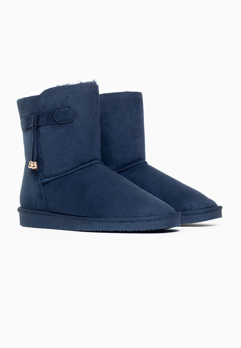 Paire de bottines fourrées Opinaca marine de trois-quarts, patte et breloques dorées