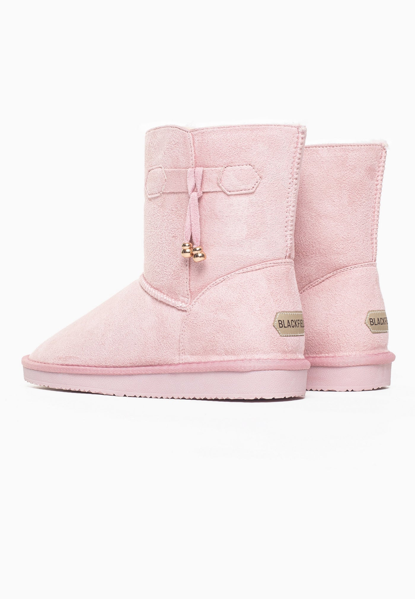 Paire de bottines fourrées Opinaca rose de dos, étiquettes Blackfield aux deux talons