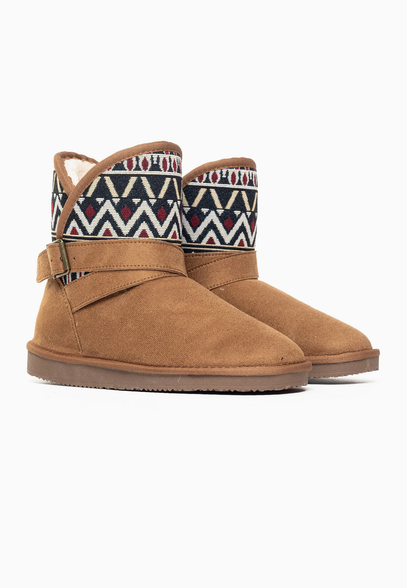 Paire de bottines fourrées Concha camel de trois-quarts, galon camel au bord