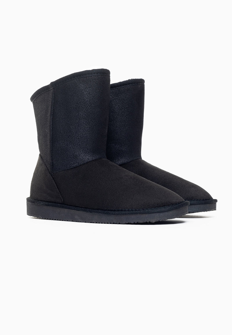 Paire de bottines fourrées Clane noires de trois-quarts face, semelle plate et fine