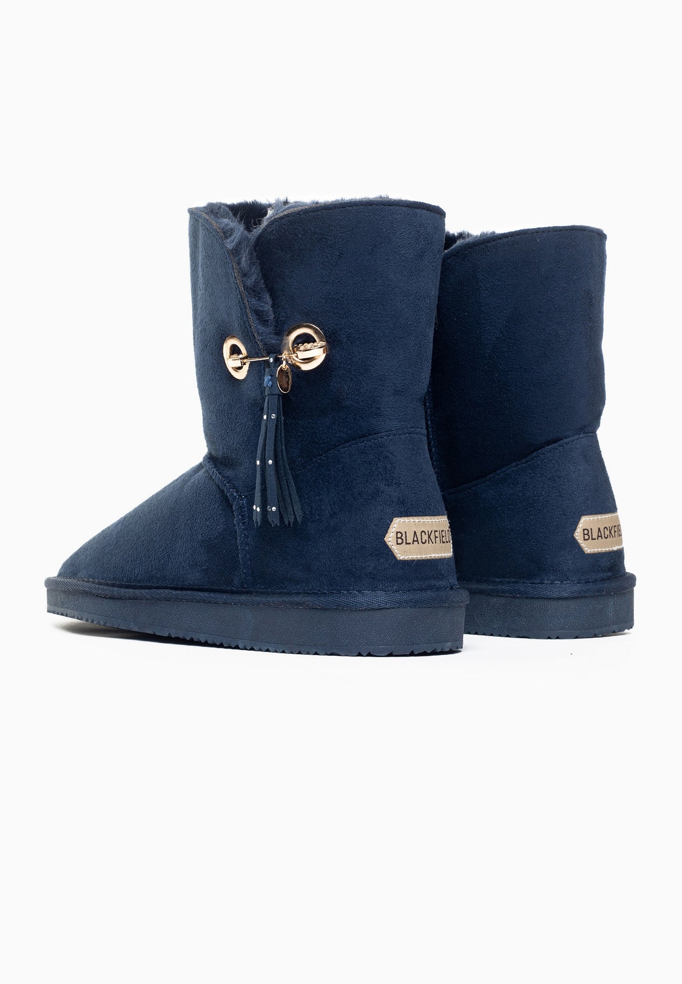 Paire de bottines fourrées Clair marine vue de dos, étiquettes claires aux talons