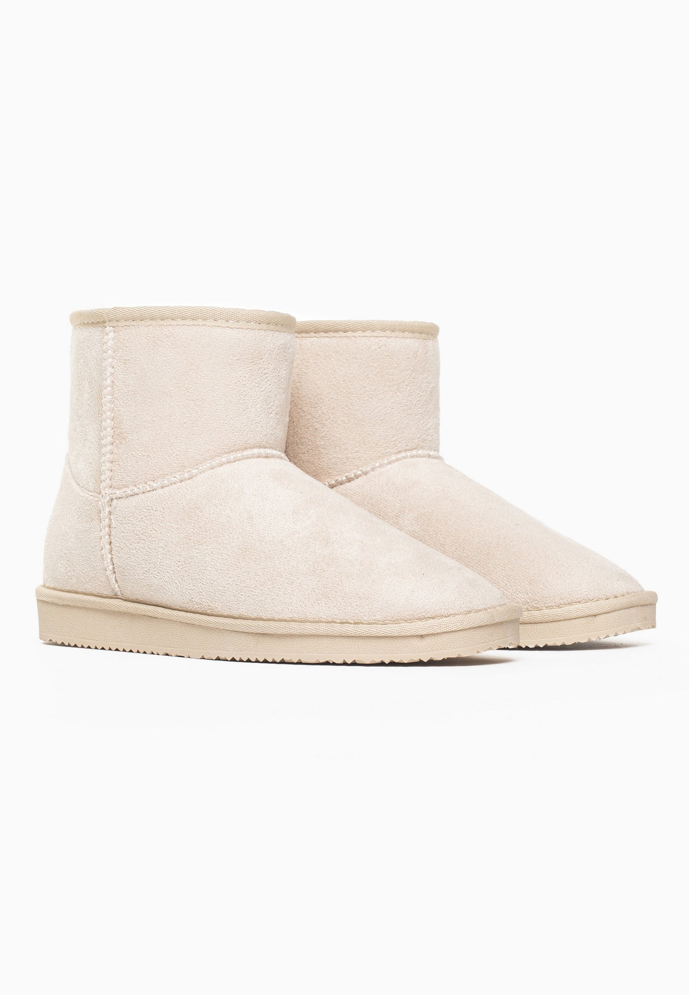 Paire de bottines fourrées Princesse naturel vue de trois-quarts avant, semelle crème