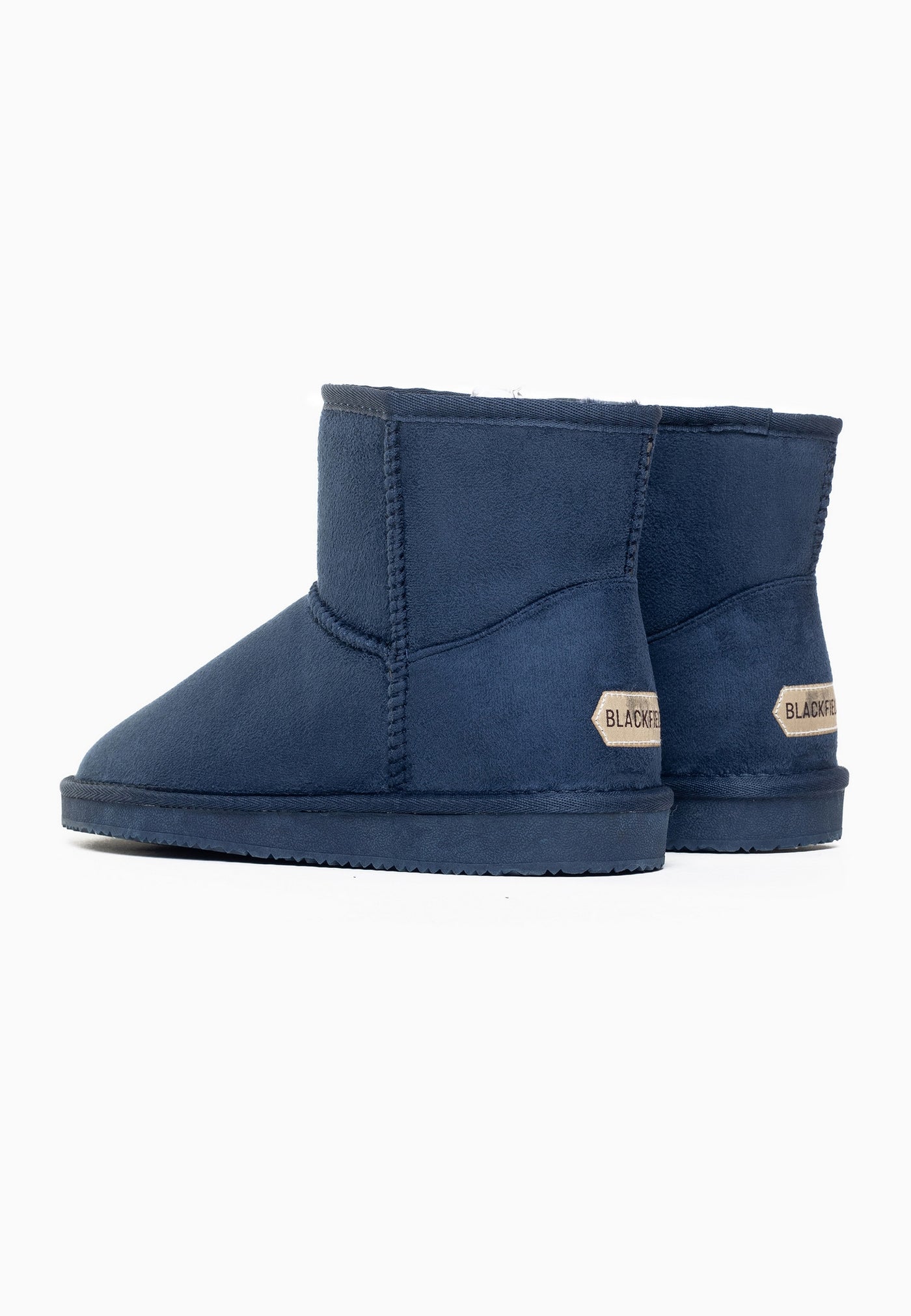 Paire de bottines fourrées Princesse marine de dos, deux étiquettes beiges aux talons