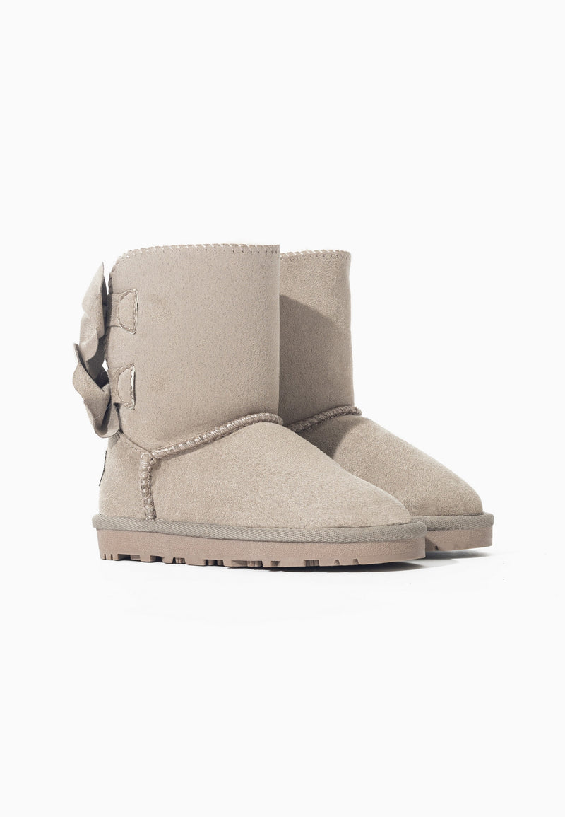 Paire de bottes fourrées Belezza naturel vue de trois-quarts, nœuds froncés à l'arrière