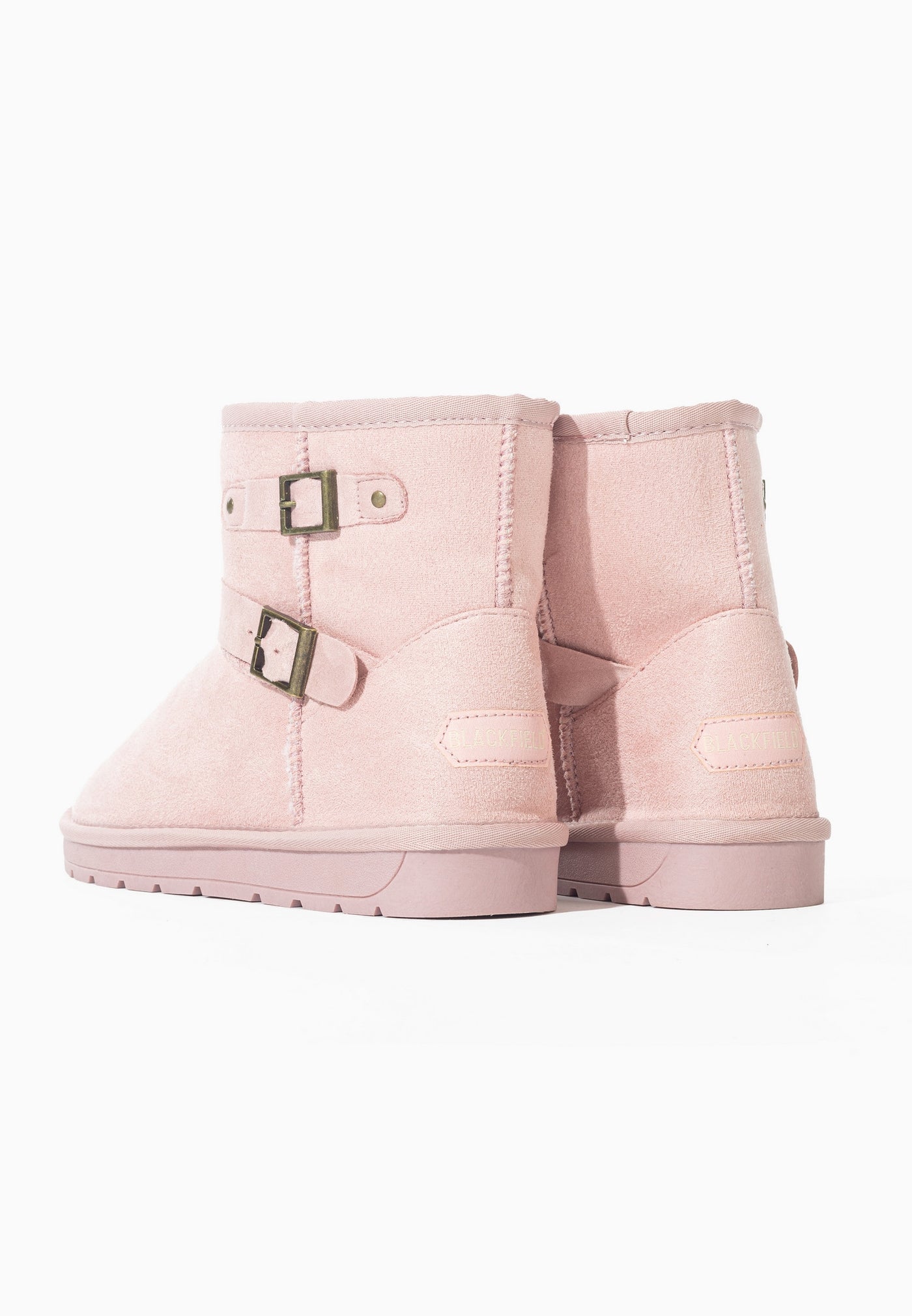 Bottines fourrées Olwen rose vues de dos, contreforts arrondis et semelle rose crantée