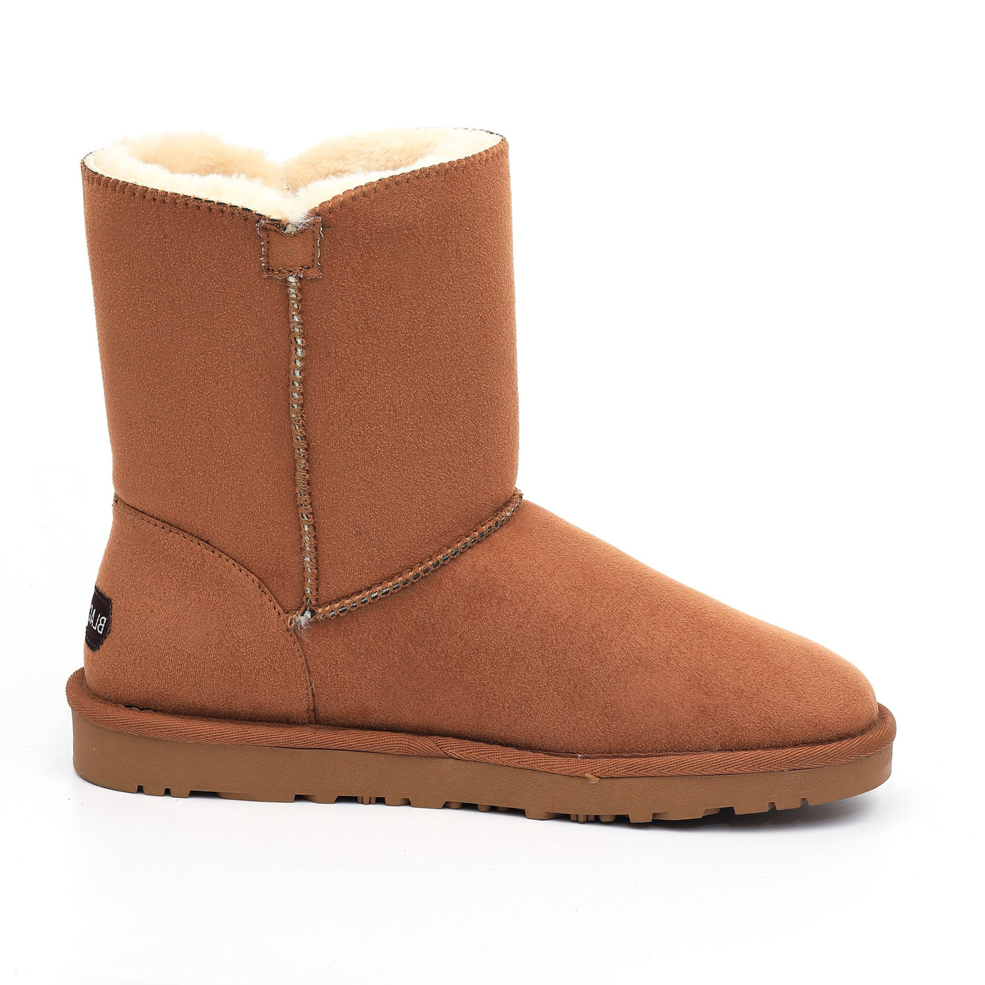 Bottine fourrée Lola camel de profil, côté lisse à encoche en V et couture verticale