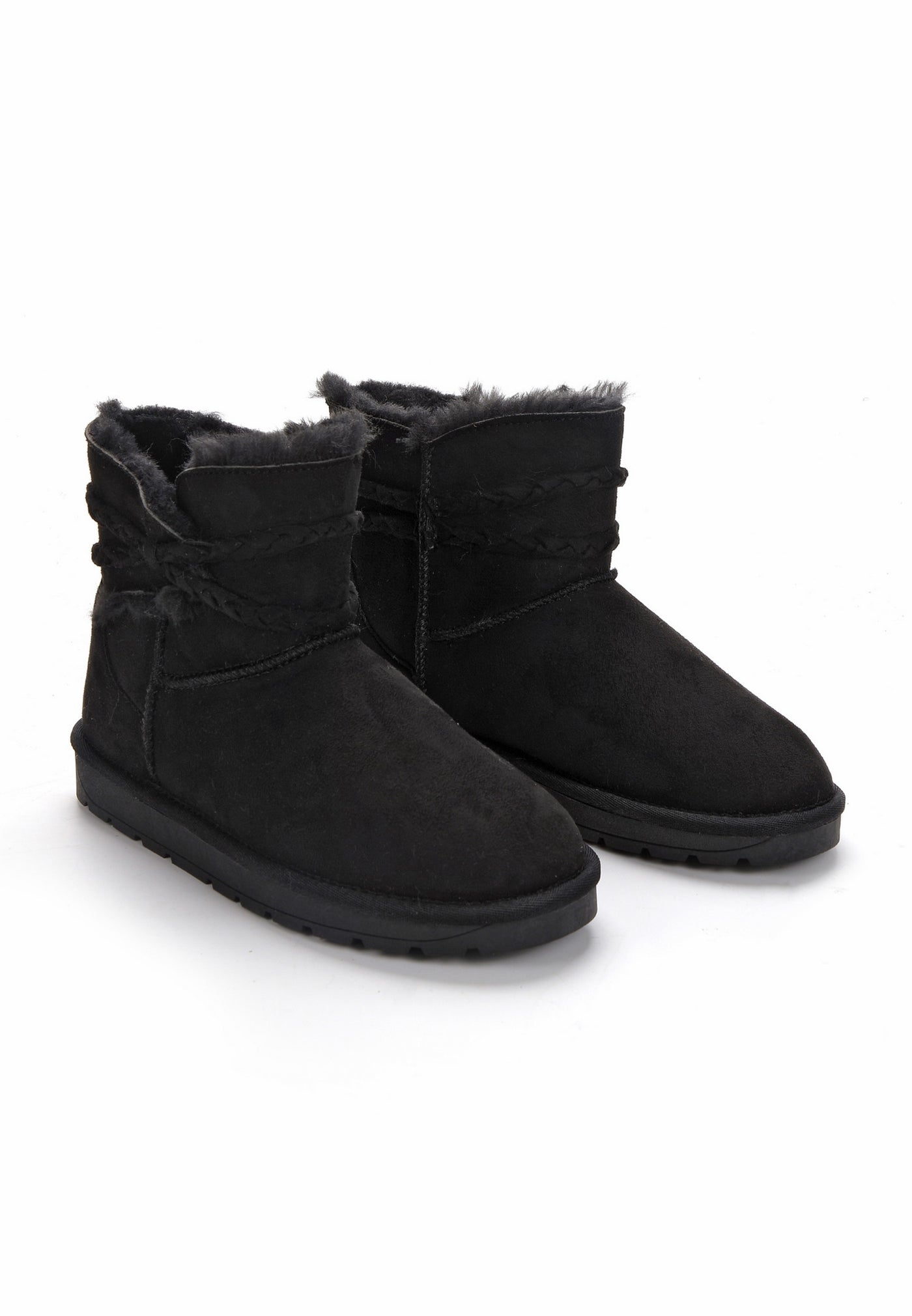 Deux bottines fourrées Mergie noires de trois-quarts, tresses enroulées sur la tige