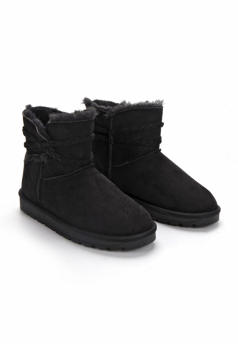 Deux bottines fourrées Mergie noires de trois-quarts, tresses enroulées sur la tige
