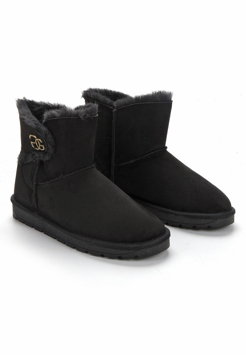 Bottines fourrées Mebrela noires en paire, monogramme doré sur le quartier gauche