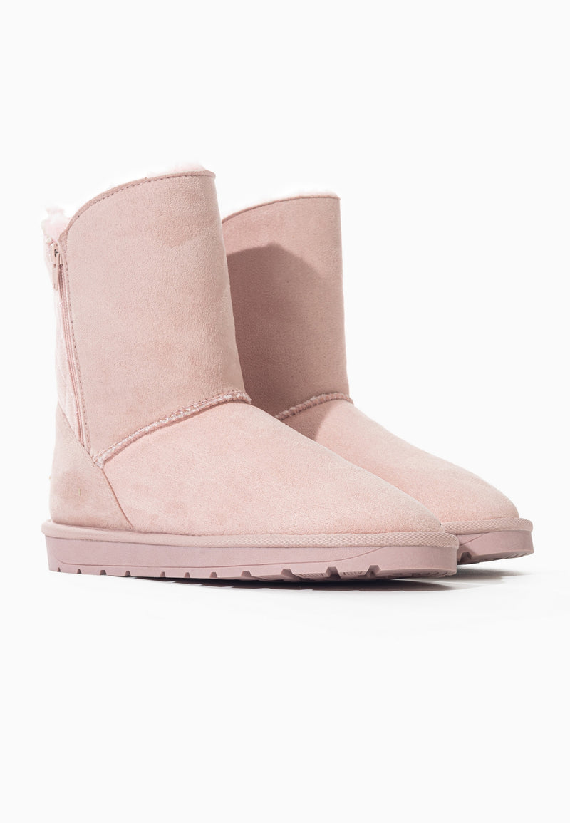 Paire de bottines fourrées Abuela rose vue de trois-quarts, zip ton sur ton fermé