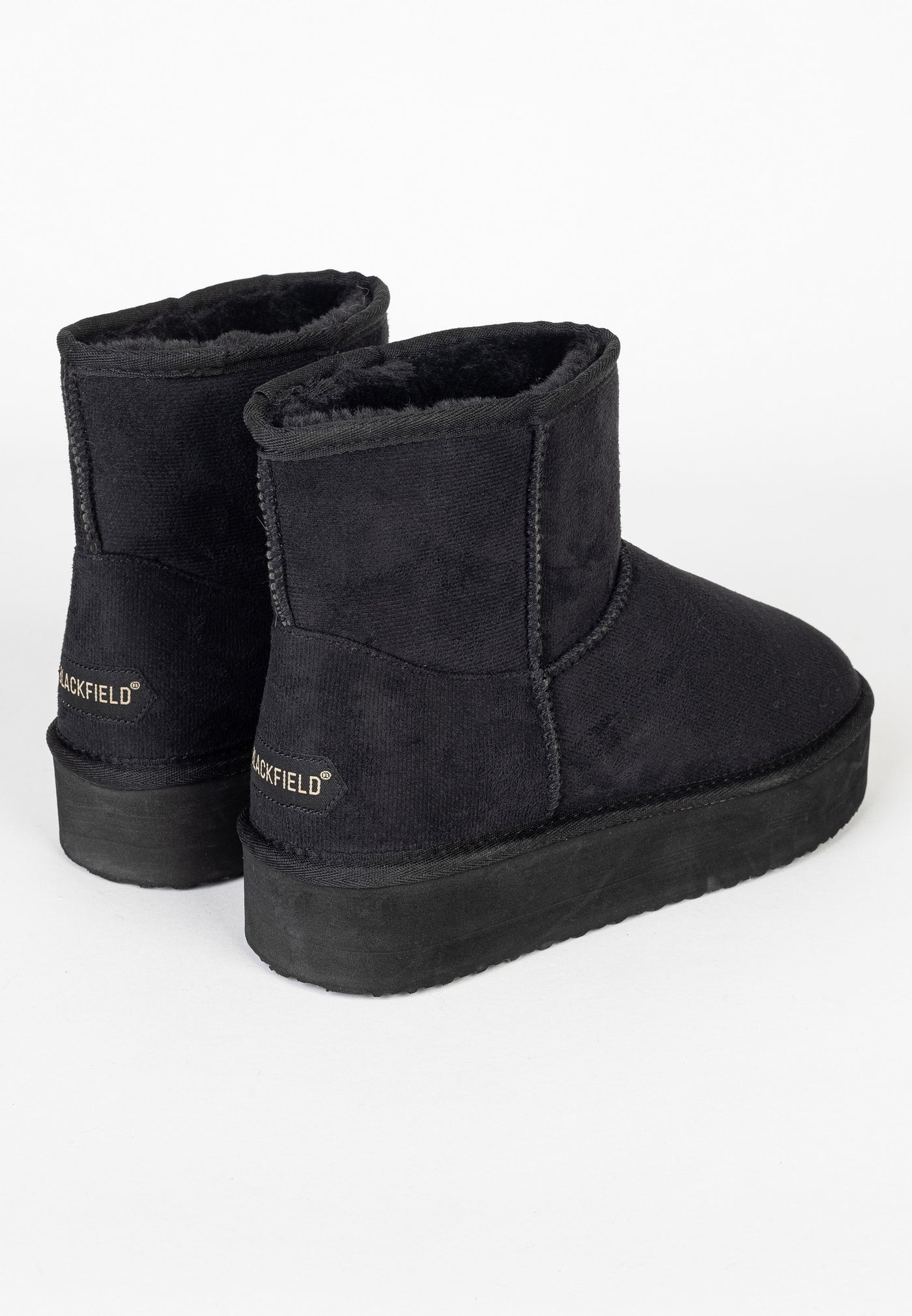 Bottines fourrées Princesse noires vues de trois-quarts arrière, marquages aux talons
