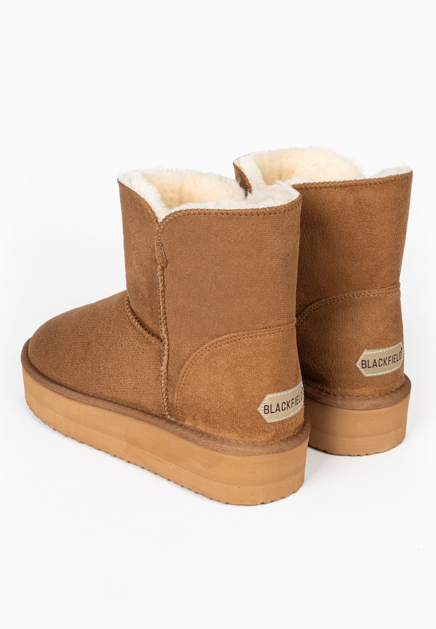Paire de bottines fourrées Bellevue camel vue de trois-quarts arrière, semelle caramel