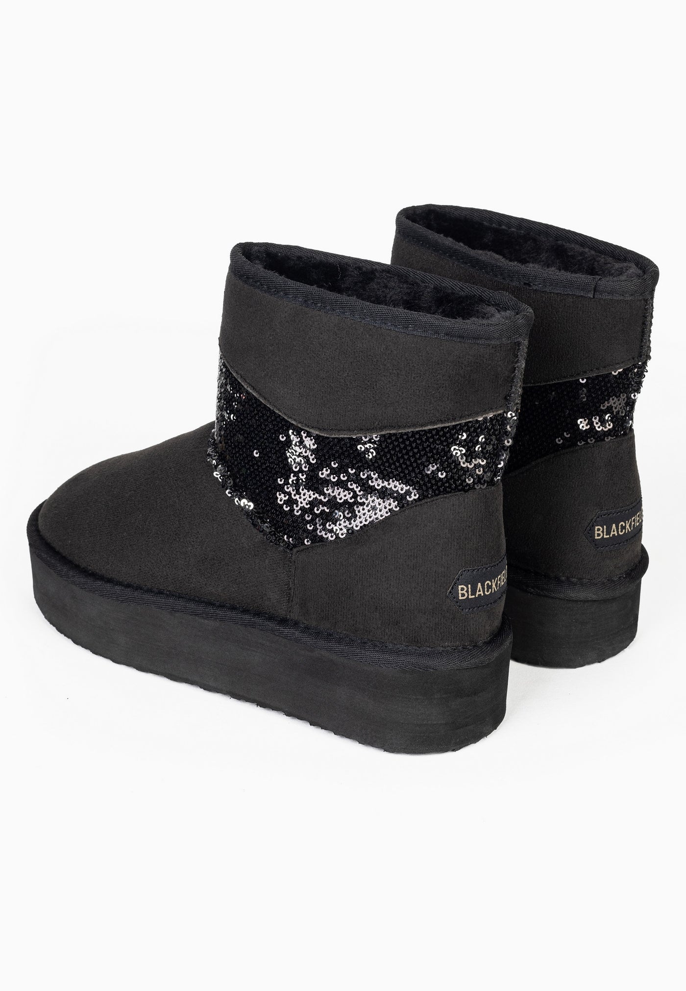 Deux bottines fourrées Garthage noires vues de trois-quarts arrière, bandeaux pailletés