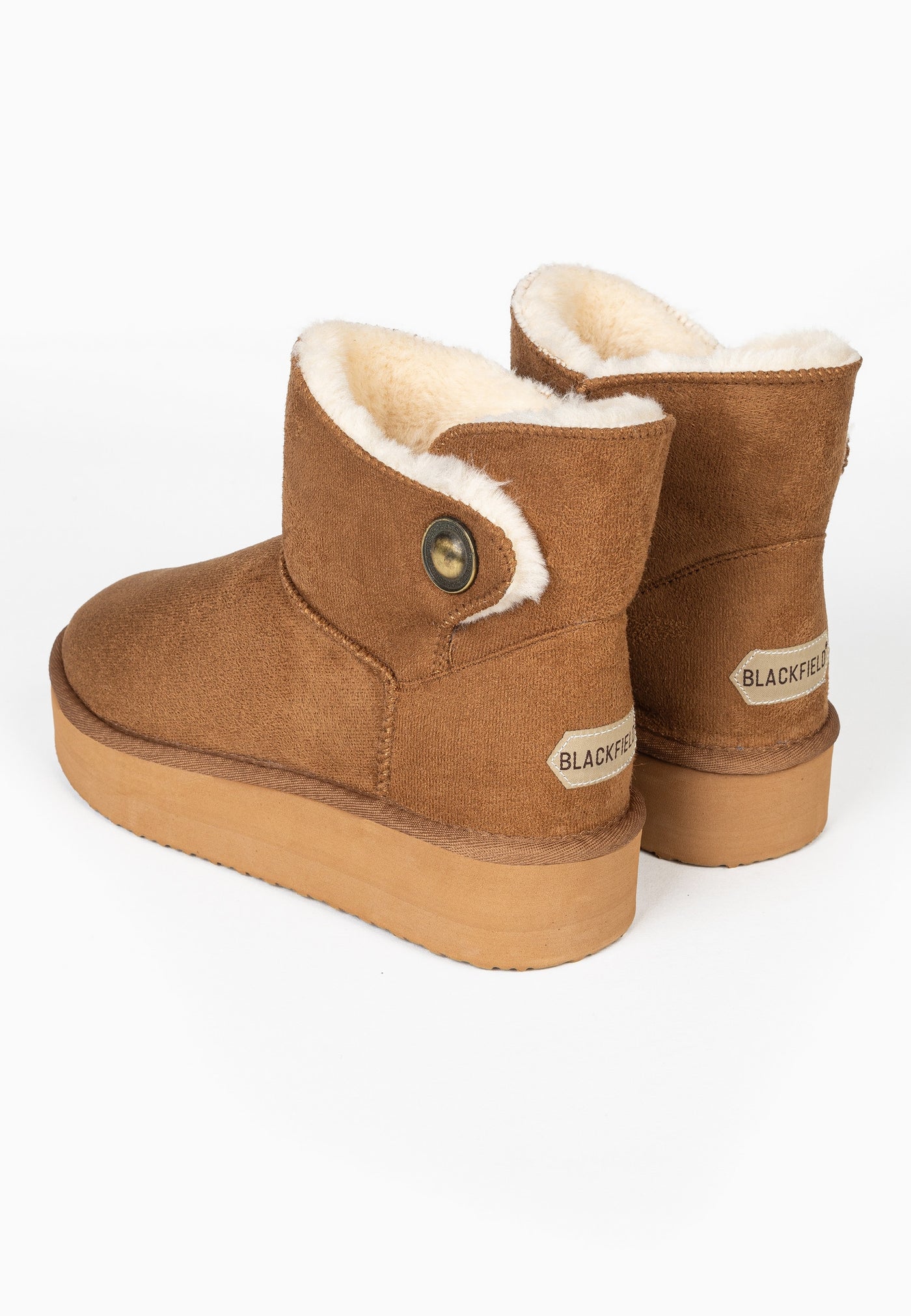 Paire de bottines fourrées Cayuga camel de trois-quarts arrière, plateformes alignées